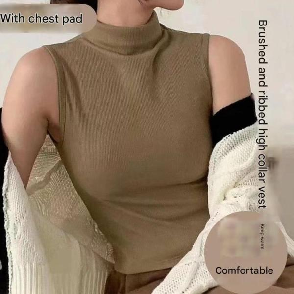 High-neck vest with chest pads. Style and comfort in one piece.
