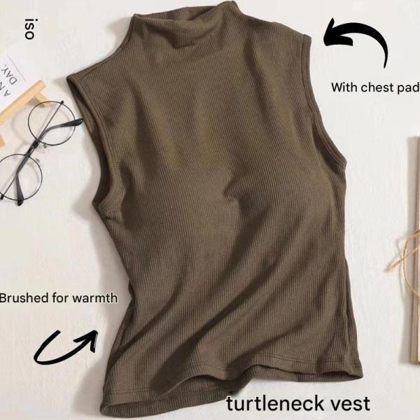 High-neck vest with chest pads. Style and comfort in one piece.