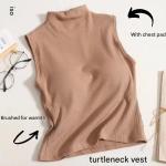 High-neck vest with chest pads. Style and comfort in one piece.