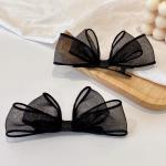 meticulously designed black mesh hairpin features a delicate, sheer design that gives you a feminine look that balances simplicity and elegance.