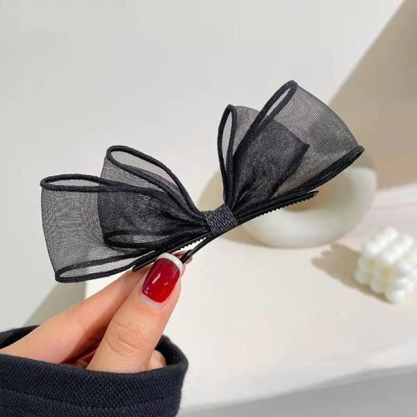 meticulously designed black mesh hairpin features a delicate, sheer design that gives you a feminine look that balances simplicity and elegance.
