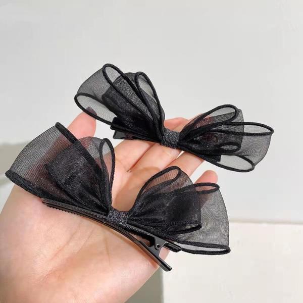 meticulously designed black mesh hairpin features a delicate, sheer design that gives you a feminine look that balances simplicity and elegance.