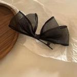 meticulously designed black mesh hairpin features a delicate, sheer design that gives you a feminine look that balances simplicity and elegance.