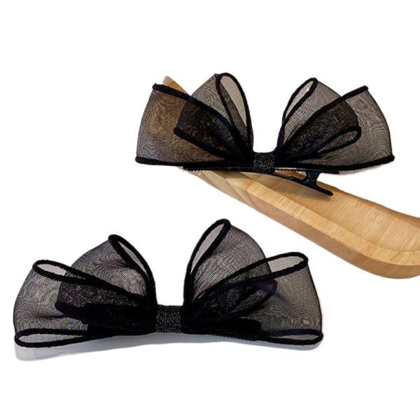 meticulously designed black mesh hairpin features a delicate, sheer design that gives you a feminine look that balances simplicity and elegance.