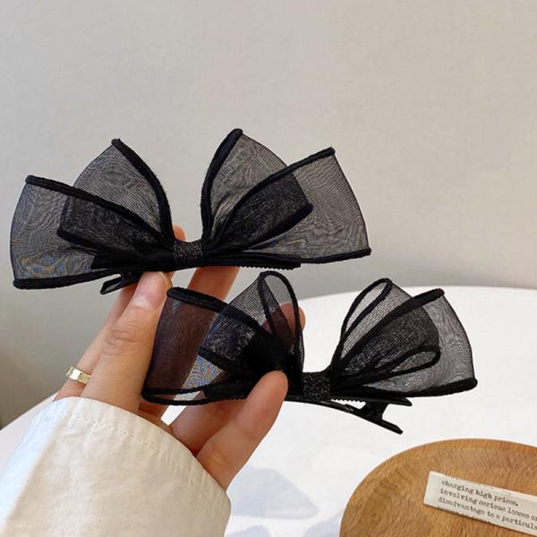 meticulously designed black mesh hairpin features a delicate, sheer design that gives you a feminine look that balances simplicity and elegance.