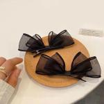 meticulously designed black mesh hairpin features a delicate, sheer design that gives you a feminine look that balances simplicity and elegance.