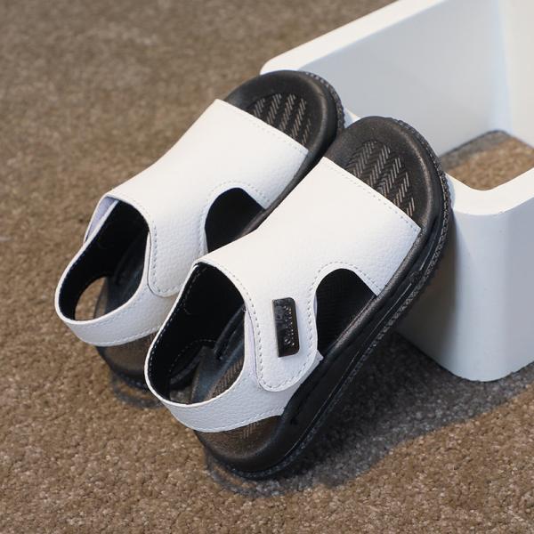 A pair of sandals for girls and boys, knitted and made of high-quality materials.