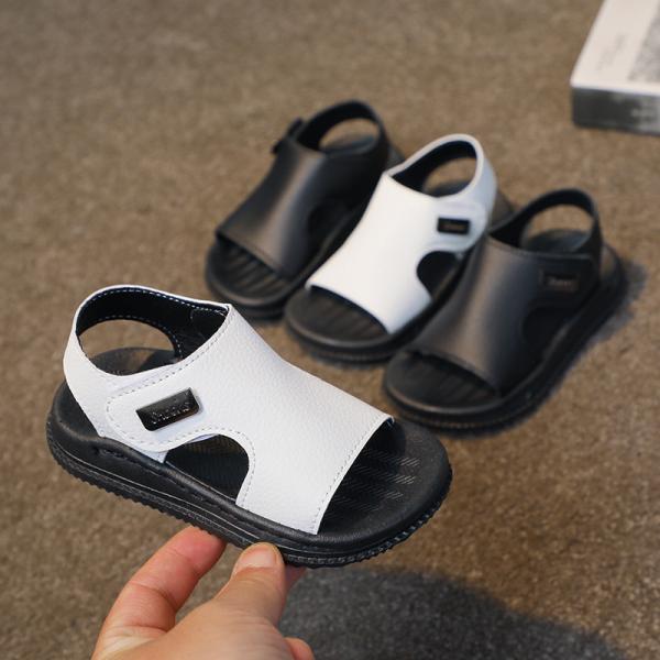 A pair of sandals for girls and boys, knitted and made of high-quality materials.