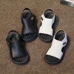 A pair of sandals for girls and boys, knitted and made of high-quality materials.