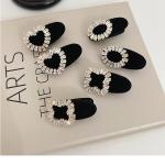 2pieces of girls' hair clips with a distinctive diamond piece and three different shapes