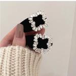 2pieces of girls' hair clips with a distinctive diamond piece and three different shapes