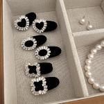 2pieces of girls' hair clips with a distinctive diamond piece and three different shapes