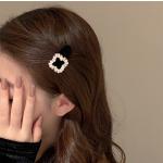 2pieces of girls' hair clips with a distinctive diamond piece and three different shapes