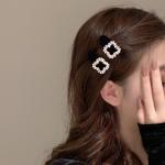 2pieces of girls' hair clips with a distinctive diamond piece and three different shapes