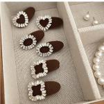 2pieces of girls' hair clips with a distinctive diamond piece and three different shapes