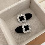 2pieces of girls' hair clips with a distinctive diamond piece and three different shapes