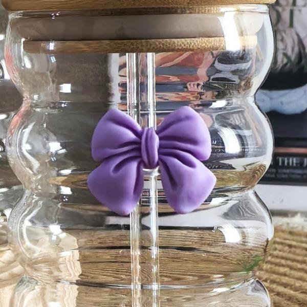 Elegant glass cup with lid and straw