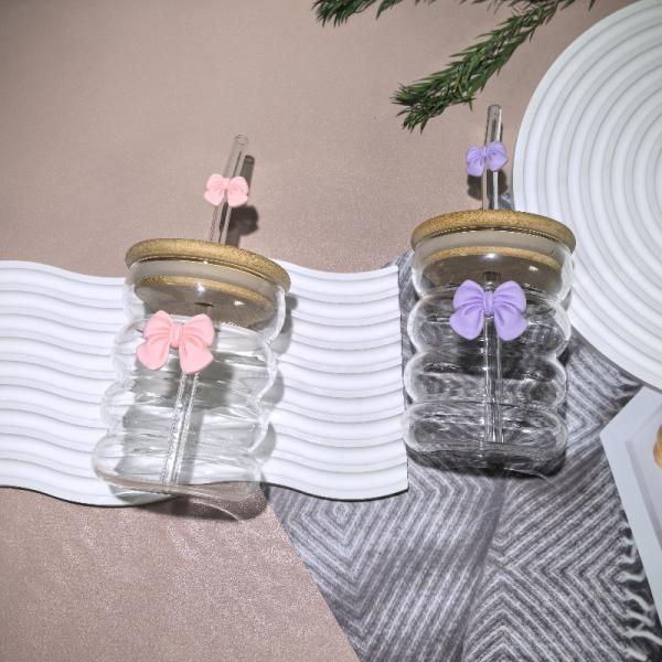 Elegant glass cup with lid and straw
