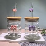 Elegant glass cup with lid and straw