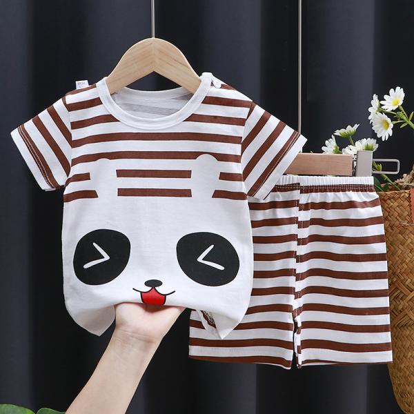 A set of short-sleeved T-shirt and matching shorts, featuring a range of attractive designs that reflect the spirit of childhood and add a touch of joy to your little one's look.
